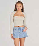 The Effortlessly Chic Long Sleeve Ruched Top in ivory with a modern design and trendy look is part of the latest women's tops collection to elevate your 2025 wardrobe.
