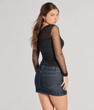 The Sweet Allure Polka Dot Sheer Mesh Long Sleeve Top in black with a modern design and trendy look is part of the latest women's tops collection to elevate your 2025 wardrobe.