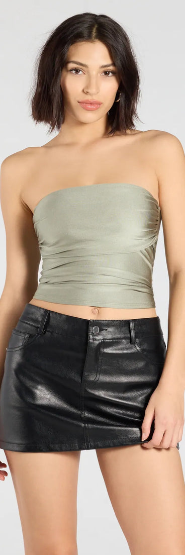 The Carefree And Cute Crop Tube Top in sage green brings edge and energy to your vibe, ready to elevate any festival look or concert outfit.