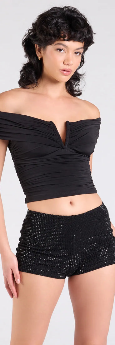 Stay on-trend this season with the Chic Alert Off-The-Shoulder Crop Top in black, a must-have for creating stylish and effortless fall outfits for women.