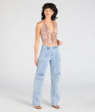 With its midriff cut and trend-forward fit, the Flirt With Destiny Halter Corset Crop Top is a brown crop top made to pair with skirts, denim, or whatever vibe you're feeling this season.