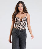 The Sultry Desire Flocked Velvet Bustier in nude brings edge and energy to your vibe, ready to elevate any festival look or concert outfit.
