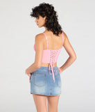 With its midriff cut and trend-forward fit, the Major Impression Lace-Up Corset Top is a pink crop top made to pair with skirts, denim, or whatever vibe you're feeling this season.