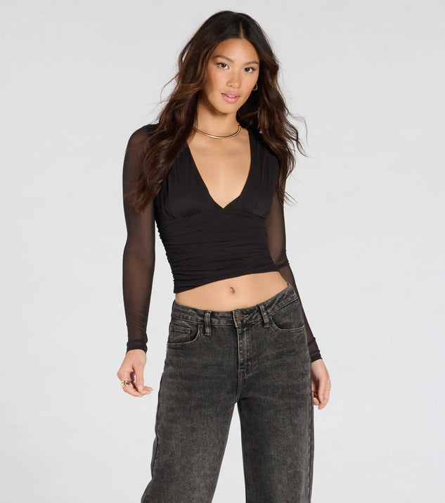 From bold to effortless, the Sassy Style Print Mesh Long Sleeve Top lets you define your vibe with black tops that speak your style.