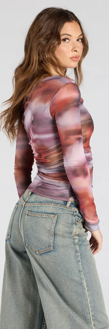 From bold to effortless, the Wildly Chic Long Sleeve Abstract Print Crop Top lets you define your vibe with multi-color tops that speak your style.