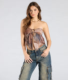 Stay on-trend this season with the Bringing The Vibes Strapless Abstract Print Crop Top in taupe, a must-have for creating stylish and effortless spring outfits for women.