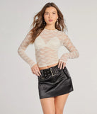 The Lady In Lace Sheer Crop Top in ivory with a modern design and trendy look is part of the latest women's tops collection to elevate your 2025 wardrobe.