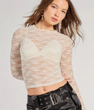 With its midriff cut and trend-forward fit, the Lady In Lace Sheer Crop Top is a ivory crop top made to pair with skirts, denim, or whatever vibe you're feeling this season.