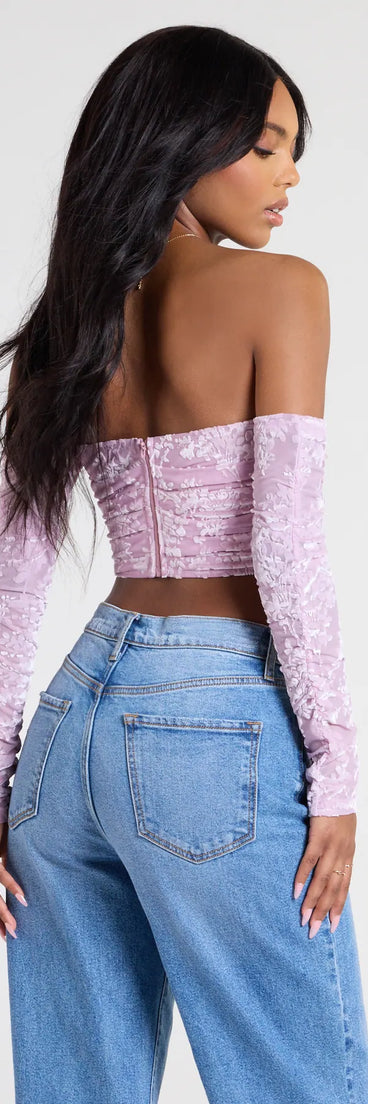 With its midriff cut and trend-forward fit, the Divine Energy Off-The-Shoulder Crop Top is a pink crop top made to pair with skirts, denim, or whatever vibe you're feeling this season.