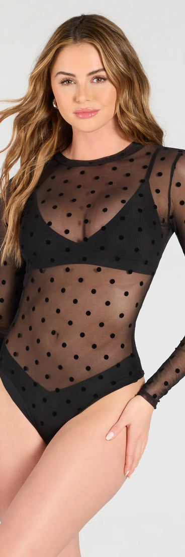 From bold to effortless, the Sheer As Can Be Polka Dot Mesh Bodysuit lets you define your vibe with black tops that speak your style.
