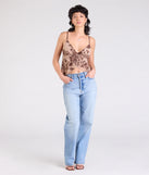 Stay on-trend this season with the Sultry Element V-Neck Floral Velvet Crop Top in mocha brown, a must-have for creating stylish and effortless spring outfits for women.