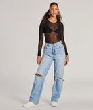 This women's black long-sleeve top combines seasonal color with rich texture, offering a versatile style that's perfect for on-trend 2025 outfits.