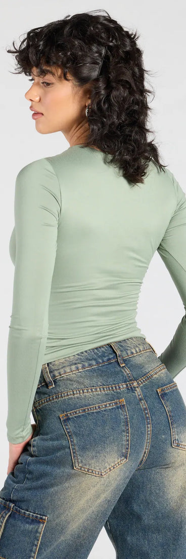 From bold to effortless, the Essential Update Long Sleeve Crop Top lets you define your vibe with sage green tops that speak your style.