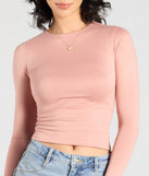 Stay on-trend this season with the Essential Update Long Sleeve Crop Top in mauve, a must-have for creating stylish and effortless spring outfits for women.