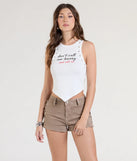 The Don't Call Me Honey Studded Graphic Crop Top in white brings edge and energy to your vibe, ready to elevate any festival look or concert outfit.