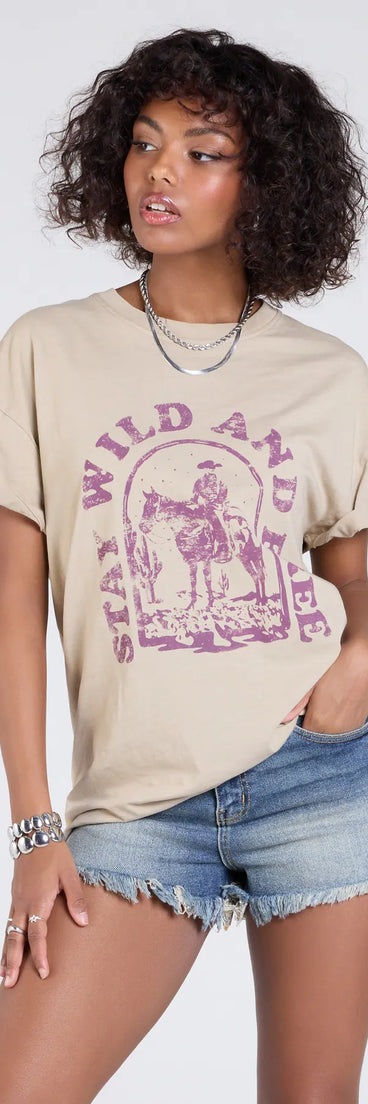 The Stay Wild Oversized Graphic Tee in taupe brings edge and energy to your vibe, ready to elevate any festival look or concert outfit.