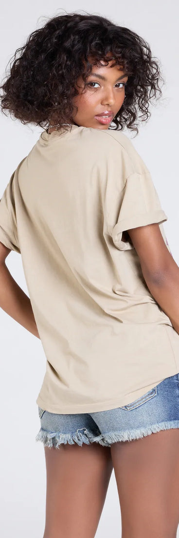 From bold to effortless, the Stay Wild Oversized Graphic Tee lets you define your vibe with taupe tops that speak your style.