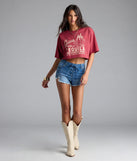 With its midriff cut and trend-forward fit, the Give Me Tequila Oversized Crop Graphic Tee is a red crop top made to pair with skirts, denim, or whatever vibe you're feeling this season.