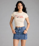 With its midriff cut and trend-forward fit, the Te Amo Tequila Graphic Tee is a ivory crop top made to pair with skirts, denim, or whatever vibe you're feeling this season.