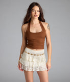 With its midriff cut and trend-forward fit, the So Adored Basic Halter Crop Top is a brown crop top made to pair with skirts, denim, or whatever vibe you're feeling this season.