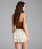 With its midriff cut and trend-forward fit, the So Adored Basic Halter Crop Top is a brown crop top made to pair with skirts, denim, or whatever vibe you're feeling this season.