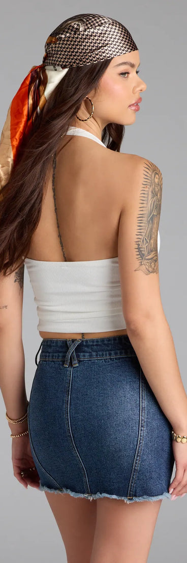 For college campus looks, game day outfits, or a bold going-out vibe, the So Adored Basic Halter Crop Top is an on-trend ivory crop top that easily styles with your favorite denim.