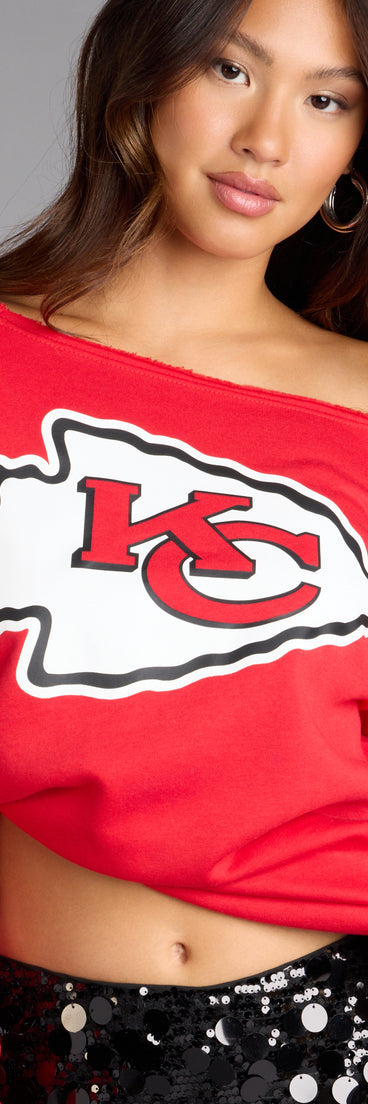 Trendy women’s tops, like the Ultra Game NFL Kansas City Chiefs Pull-Over Top, bring effortless style for fall layering, lounging, or going out.