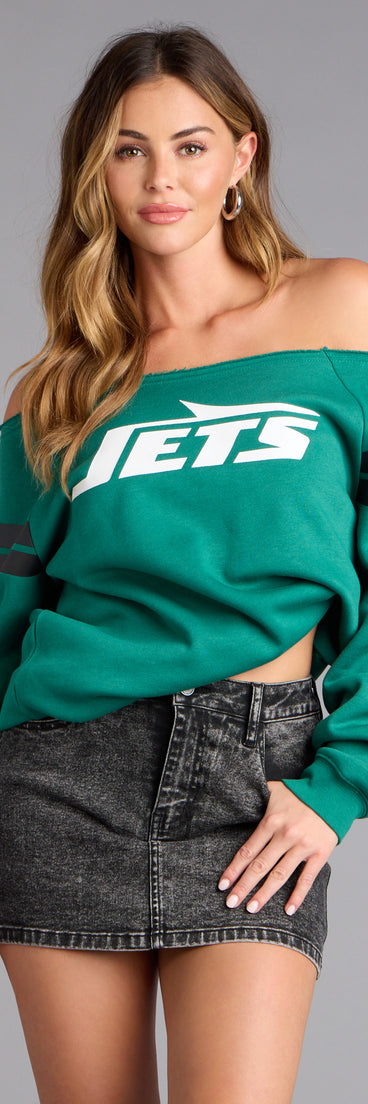 Trendy women’s tops, like the Ultra Game NFL New York Jets Pull-Over Top, bring effortless style for fall layering, lounging, or going out.