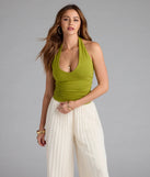 With its midriff cut and trend-forward fit, the Feel The Vibes Halter V-Neck Crop Top is a green crop top made to pair with skirts, denim, or whatever vibe you're feeling this season.