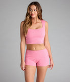 For college campus looks, game day outfits, or a bold going-out vibe, the Elevated Era Ribbed Knit Cropped Tank Top is an on-trend pink crop top that easily styles with your favorite denim.