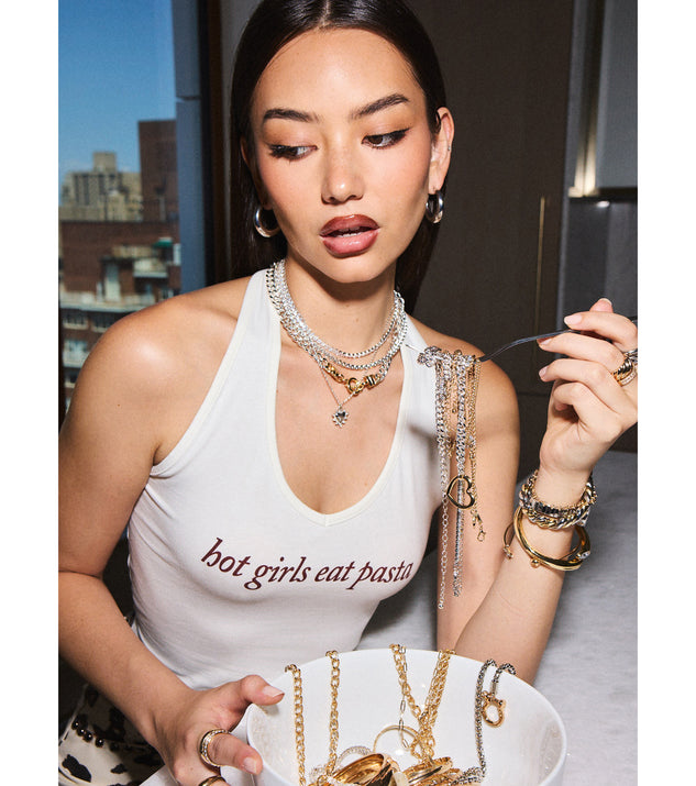 Complete your look with the Hot Girls Eat Pasta Graphic Crop Top, a trendy top that’s ready to pair with anything in your fall rotation.