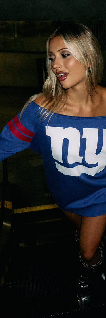 Trendy women’s tops, like the Ultra Game NFL New York Giants Pull-Over Top, bring effortless style for fall layering, lounging, or going out.