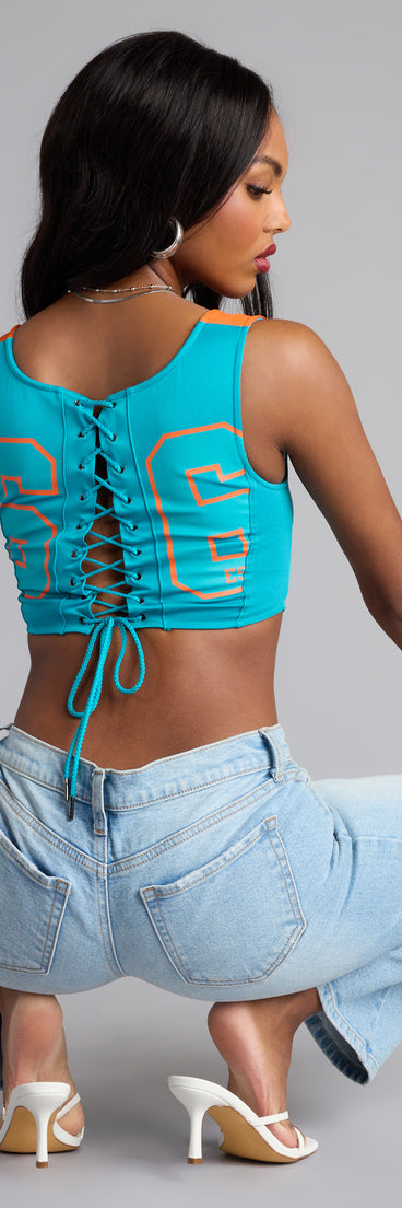 Trendy women’s tops, like the Ultra Game NFL Miami Dolphins Tank Top, bring effortless style for fall layering, lounging, or going out.