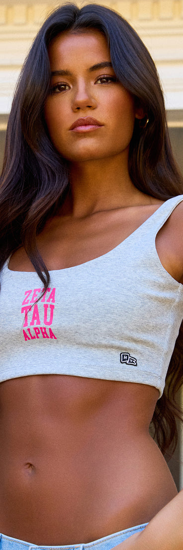 Complete your look with the Greek Life Energy Zeta Tau Alpha Crop Top, a trendy top that’s ready to pair with anything in your fall rotation.