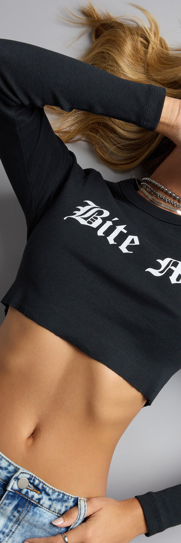 Trendy women’s tops, like the Bite Me Graphic Long Sleeve Crop Top, bring effortless style for fall layering, lounging, or going out.