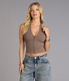 Trendy women’s tops, like the Hooked On You Halter Tank Top, bring effortless style for fall layering, lounging, or going out.