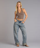 Trendy women’s tops, like the Hooked On You Halter Tank Top, bring effortless style for fall layering, lounging, or going out.