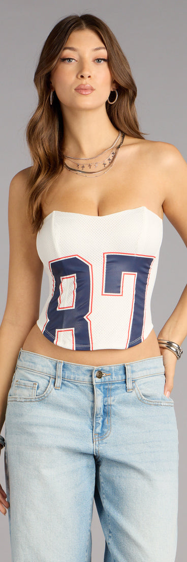 This trendy top is perfect for layering or standing out solo—your go-to piece for holiday attire, NYE party outfits, or easy celebration-ready styling in the Game On Jersey 87 Corset Top .