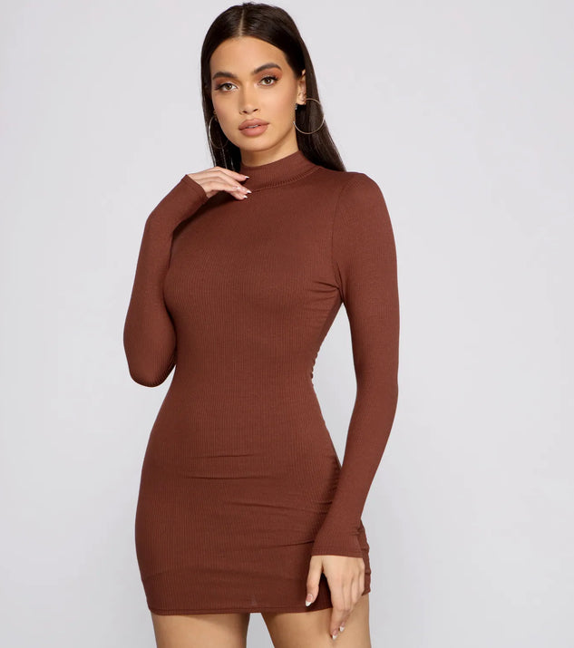 The Basic Ribbed Knit Long Sleeve Mini Dress is a mini dress that will make a statement with its short hemline and on-trend details to have you ready for any event!