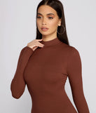 Make a bold statement in the Basic Ribbed Knit Long Sleeve Mini Dress in brown, the perfect spring dress for weddings, cocktail hours, nights out, and/or seasonal celebrations.