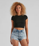 The Casual Must-Have Crew Neck Crop Top in black with a modern design and trendy look is part of the latest women's tops collection to elevate your 2025 wardrobe.