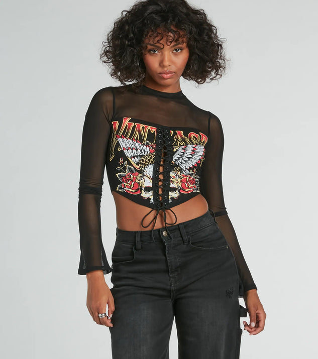 Stand out this winter in the Vintage Lace-Up Mesh Graphic Crop Top, a women's black long-sleeve top crafted from an elevated fabric with a modern necklineperfect for party outfits, holiday attire, or elevated casual outfits.