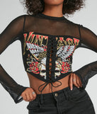 This women's black long-sleeve top combines seasonal color with rich texture, offering a versatile style that's perfect for on-trend winter or holiday outfits.