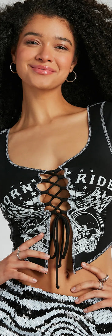 The Born To Ride Lace-Up Crop Graphic Tee in black with a modern design and trendy look is part of the latest women's tops collection to elevate your 2025 wardrobe.