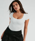 Elevate your winter outfits with the Minimal Chic Ribbed Knit Long Sleeve Bodysuit, a white bodysuit designed for confident and effortless styling with anything from mini skirts to high-waist jeans.