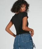 The Moto Babe Cutout Knit Graphic Tee in black with a modern design and trendy look is part of the latest women's tops collection to elevate your 2025 wardrobe.