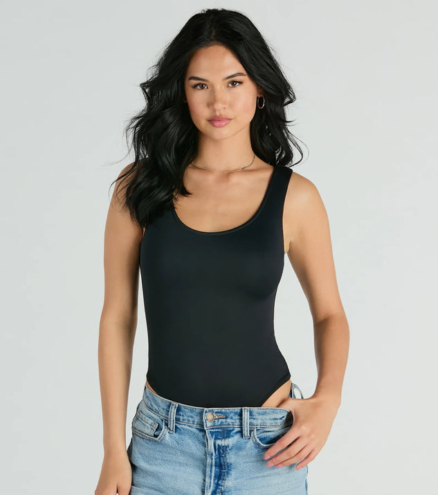 The Smooth Silhouette Sleeveless Scoop Neck Bodysuit in black with a modern design and trendy look is part of the latest women's tops collection to elevate your 2025 wardrobe.