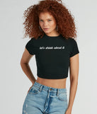 The Let's Drink About It Crop Graphic Tee in black with a modern design and trendy look is part of the latest women's tops collection to elevate your 2025 wardrobe.