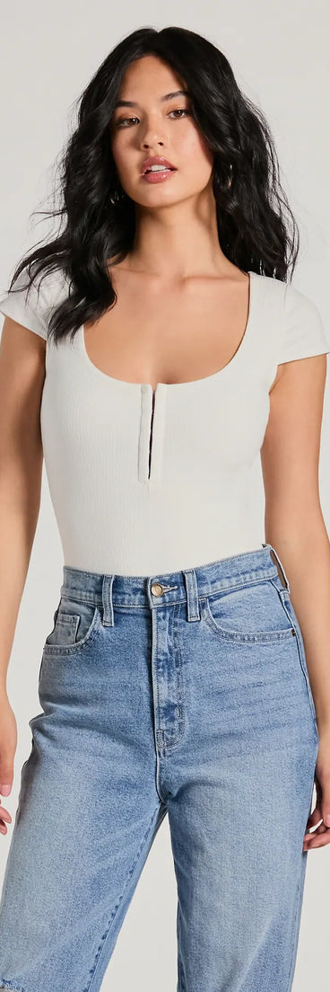 The Trendy Vibe Hook And Eye Ribbed Knit Bodysuit in white with a modern design and trendy look is part of the latest women's tops collection to elevate your 2025 wardrobe.