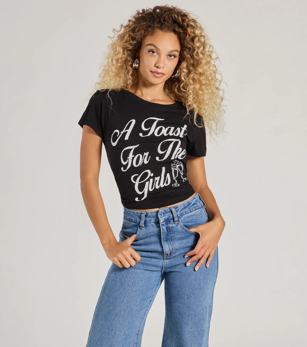 The A Toast For The Girls Crop Graphic Tee in black with a modern design and trendy look is part of the latest women's tops collection to elevate your 2025 wardrobe.